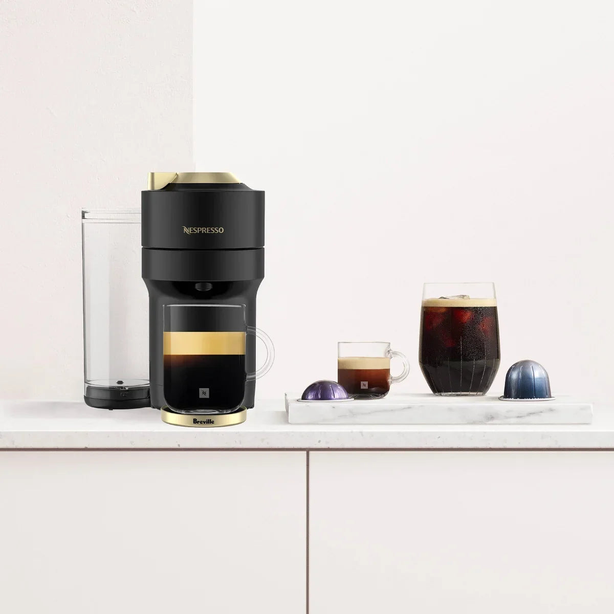 Nespresso Vertuo Pop+ Deluxe Coffee and Espresso Machine by Breville with Aeroccino with $25 Nespresso Coffee Credit, Matte Black and Gold